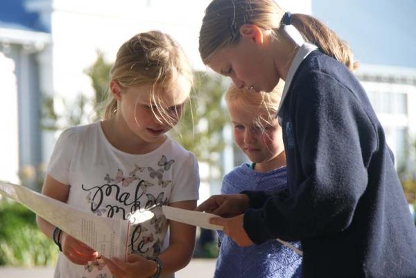 Kids working out Rogaine map