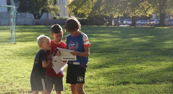 Kids working out Rogaine map